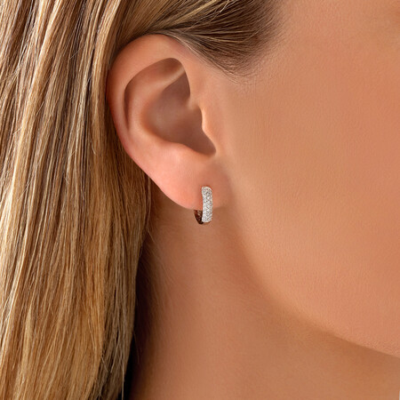 Huggie Earrings With 1/4 Carat TW Of Diamonds In 10kt White Gold Huggie Earrings With 1/4 Carat TW Of Diamonds In 10kt White Gold
