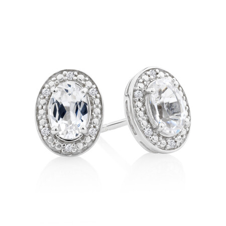 Halo Earrings with Created White Sapphire and 0.04 Carat TW of Diamonds in Sterling Silver Halo Earrings with Created White Sapphire and 0.04 Carat TW of Diamonds in Sterling Silver