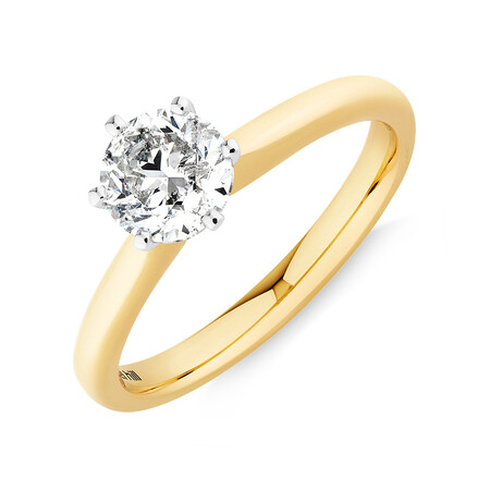 Certified Solitaire Engagement Ring with a 1 Carat TW Diamond in 18kt Yellow/White Gold Certified Solitaire Engagement Ring with a 1 Carat TW Diamond in 18kt Yellow/White Gold