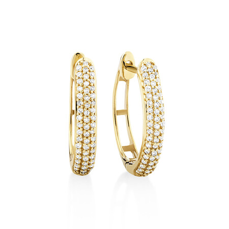 Oval Earrings with 0.20 Carat TW of Diamonds in 10ct Yellow Gold Oval Earrings with 0.20 Carat TW of Diamonds in 10ct Yellow Gold