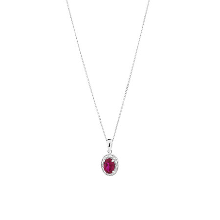 Halo Pendant with Created Ruby and 0.04 TW of Diamonds in Sterling Silver Halo Pendant with Created Ruby and 0.04 TW of Diamonds in Sterling Silver
