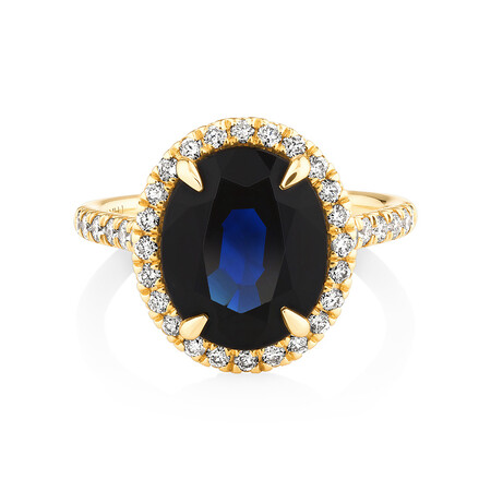 Halo Ring with Sapphire & 0.62 Carat TW of Diamonds in 14kt Yellow Gold Halo Ring with Sapphire & 0.62 Carat TW of Diamonds in 14kt Yellow Gold