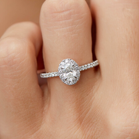 Halo Oval Engagement Ring with 0.92 Carat TW of Diamonds in 14ct White Gold Halo Oval Engagement Ring with 0.92 Carat TW of Diamonds in 14ct White Gold