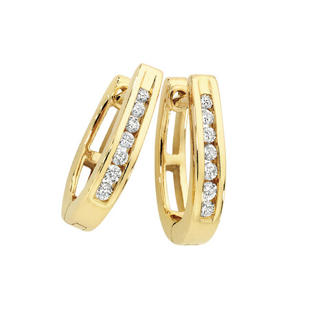 Huggie Earrings with 0.15 Carat TW of Diamonds in 10ct Yellow Gold Huggie Earrings with 0.15 Carat TW of Diamonds in 10ct Yellow Gold