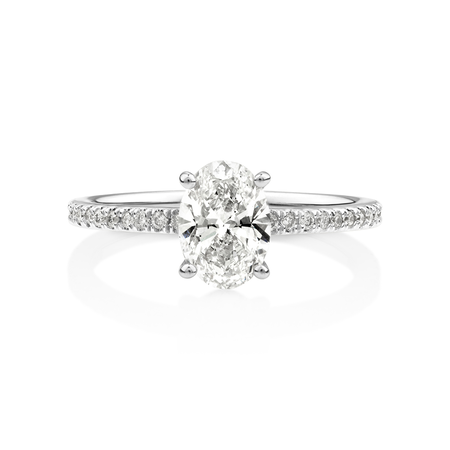 Engagement Ring with 1.14 Carat TW of Diamonds. A 1 Carat Oval Centre Laboratory-Created Diamond and shouldered by 0.14 Carat TW of Natural Diamonds in 14kt White Gold Engagement Ring with 1.14 Carat TW of Diamonds. A 1 Carat Oval Centre Laboratory-Created Diamond and shouldered by 0.14 Carat TW of Natural Diamonds in 14kt White Gold