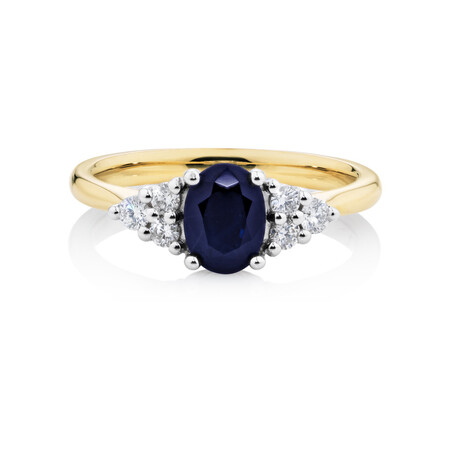 Ring With Diamonds And Blue Sapphire In 10ct Yellow And White Gold Ring With Diamonds And Blue Sapphire In 10ct Yellow And White Gold