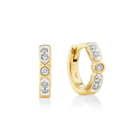 Hoop Earrings with 0.10 Carat TW of Diamonds in 10kt Yellow Gold Hoop Earrings with 0.10 Carat TW of Diamonds in 10kt Yellow Gold