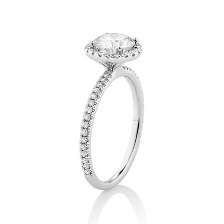 Halo Engagement Ring with 1.23 Carat TW of Diamonds. A 1 Carat Round Brilliant Laboratory-Created Centre Diamond and 0.23 Carat TW of Natural Diamonds in the Shoulders and Halo in 14kt White Gold Halo Engagement Ring with 1.23 Carat TW of Diamonds. A 1 Carat Round Brilliant Laboratory-Created Centre Diamond and 0.23 Carat TW of Natural Diamonds in the Shoulders and Halo in 14kt White Gold