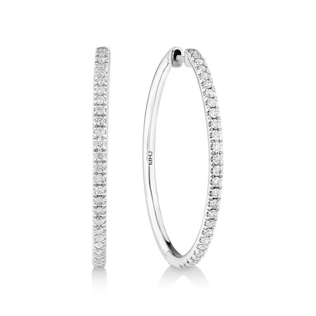 Huggies with 0.60 Carat TW of Diamonds in 10kt White Gold Huggies with 0.60 Carat TW of Diamonds in 10kt White Gold