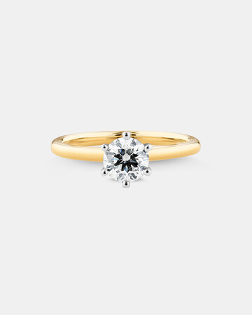 Michael Hill Solitaire Engagement Ring with a 0.70 Carat TW Diamond with the De Beers Code of Origin in 18kt Yellow & White Gold Michael Hill Solitaire Engagement Ring with a 0.70 Carat TW Diamond with the De Beers Code of Origin in 18kt Yellow & White Gold