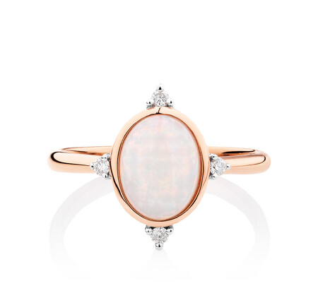 Ring with Opal & Diamonds in 10kt Rose Gold Ring with Opal & Diamonds in 10kt Rose Gold
