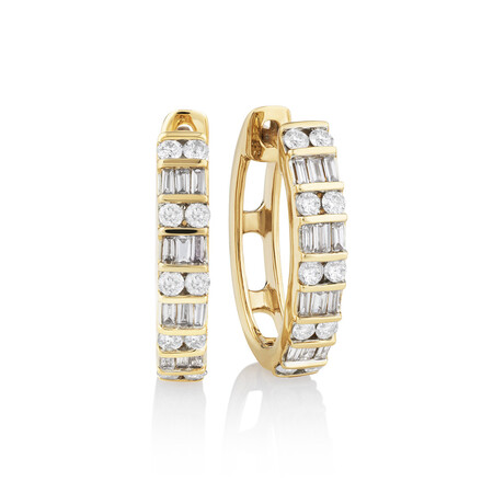 Huggie Earrings with 0.50 Carat TW of Diamonds in 10ct Yellow Gold Huggie Earrings with 0.50 Carat TW of Diamonds in 10ct Yellow Gold