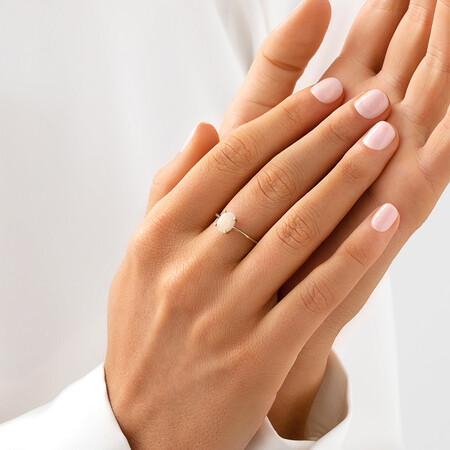 Solitaire Ring with Opal in 10kt Yellow Gold Solitaire Ring with Opal in 10kt Yellow Gold