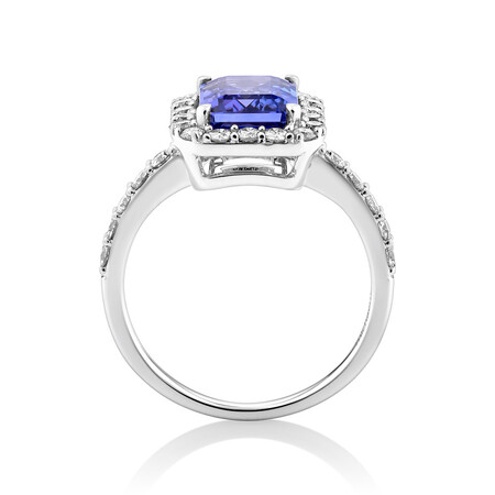 Halo Ring with Tanzanite & 0.75 Carat TW of Diamonds in 14kt White Gold Halo Ring with Tanzanite & 0.75 Carat TW of Diamonds in 14kt White Gold