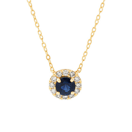 Halo Pendant with Sapphire & 0.14 Carat TW of Diamonds in 10kt Yellow Gold Halo Pendant with Sapphire & 0.14 Carat TW of Diamonds in 10kt Yellow Gold