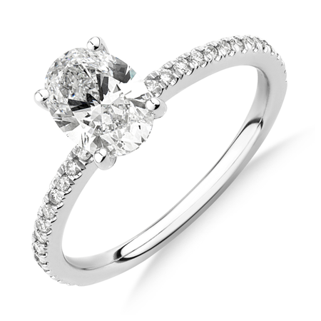 Engagement Ring with 1.14 Carat TW of Diamonds. A 1 Carat Oval Centre Laboratory-Created Diamond and shouldered by 0.14 Carat TW of Natural Diamonds in 14kt White Gold Engagement Ring with 1.14 Carat TW of Diamonds. A 1 Carat Oval Centre Laboratory-Created Diamond and shouldered by 0.14 Carat TW of Natural Diamonds in 14kt White Gold