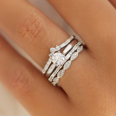 Evermore Wedding Band with 0.20 Carat TW of Diamonds in 10kt White Gold Evermore Wedding Band with 0.20 Carat TW of Diamonds in 10kt White Gold