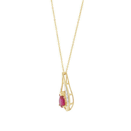 Pear Drop Pendant with Laboratory Created Ruby & Natural Diamonds in 10kt Yellow Gold Pear Drop Pendant with Laboratory Created Ruby & Natural Diamonds in 10kt Yellow Gold