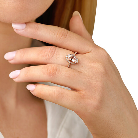 Halo Ring with Morganite & 0.20 Carat TW of Diamonds in 10kt Rose Gold Halo Ring with Morganite & 0.20 Carat TW of Diamonds in 10kt Rose Gold