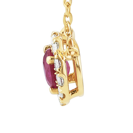 Halo Pendant with Ruby & 0.14 Carat TW of Diamonds in 10kt Yellow Gold Halo Pendant with Ruby & 0.14 Carat TW of Diamonds in 10kt Yellow Gold