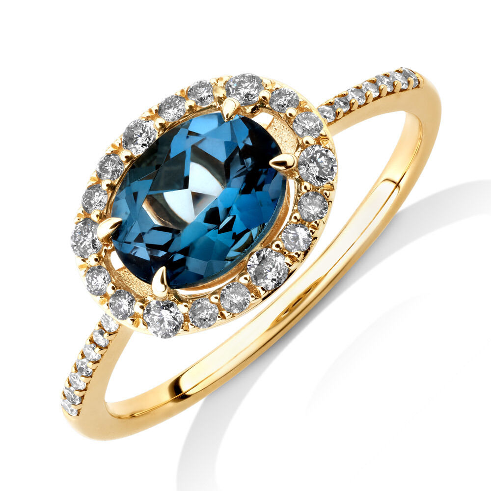 Halo Ring with London Blue Topaz 0.25 Carat TW of Diamonds in 10kt Yellow Gold