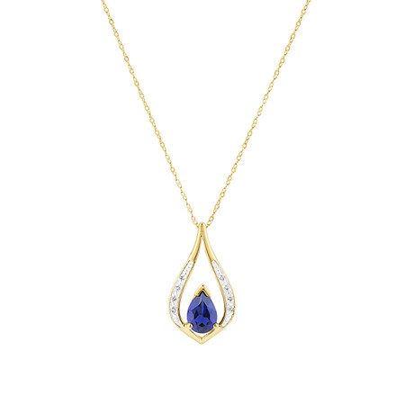 Pendant with Laboratory Created Sapphire & Natural Diamonds in 10kt Yellow Gold Pendant with Laboratory Created Sapphire & Natural Diamonds in 10kt Yellow Gold