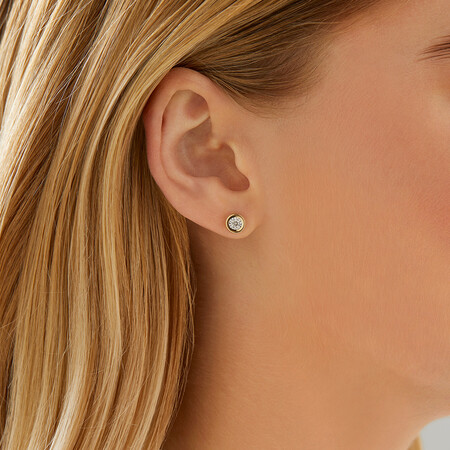 Stud Earrings with 0.15 Carat TW of Diamonds in 10kt Yellow Gold Stud Earrings with 0.15 Carat TW of Diamonds in 10kt Yellow Gold