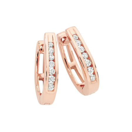 Huggie Earrings with 0.15 Carat TW of Diamonds in 10kt Rose Gold