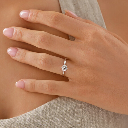 Certified Solitaire Engagement Ring with a 3/4 Carat TW Diamond in 18kt White Gold Certified Solitaire Engagement Ring with a 3/4 Carat TW Diamond in 18kt White Gold