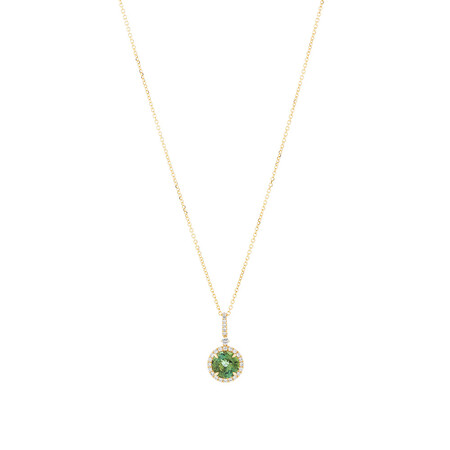 Halo Pendant with Green Tourmaline & 0.19 Carat TW of Diamonds in 14kt Yellow Gold