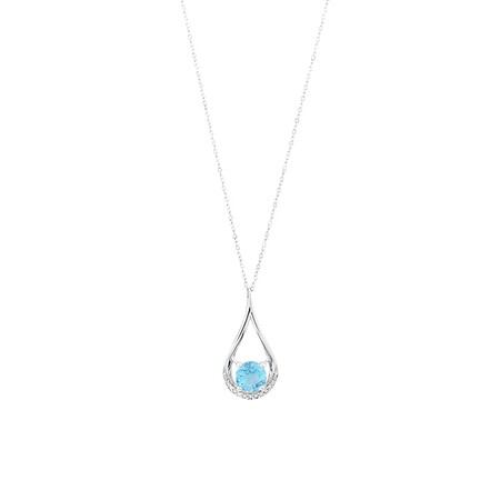Drop Pendant with Blue Topaz & Diamonds In 10kt White Gold Drop Pendant with Blue Topaz & Diamonds In 10kt White Gold