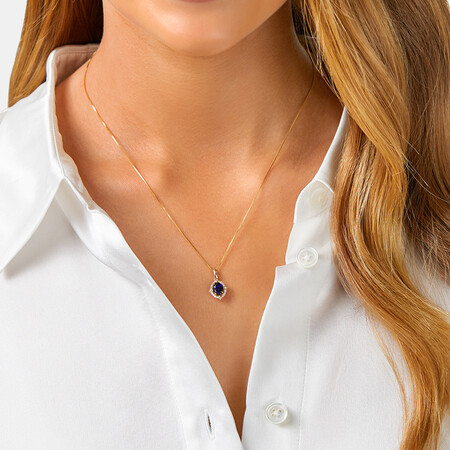 Pendant with Laboratory Created Sapphire & Natural Diamonds in 10kt Yellow Gold Pendant with Laboratory Created Sapphire & Natural Diamonds in 10kt Yellow Gold