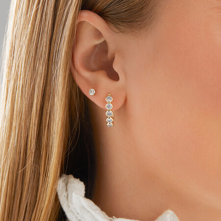 Huggie Earrings with 1/2 Carat TW of Diamonds in 10ct Yellow Gold Huggie Earrings with 1/2 Carat TW of Diamonds in 10ct Yellow Gold