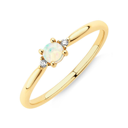 3 Stone Ring with Opal & Diamonds in 10kt Yellow Gold 3 Stone Ring with Opal & Diamonds in 10kt Yellow Gold