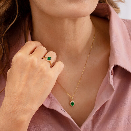 Halo Pendant with Laboratory Created Emerald & Natural Diamonds in 10kt Yellow Gold Halo Pendant with Laboratory Created Emerald & Natural Diamonds in 10kt Yellow Gold