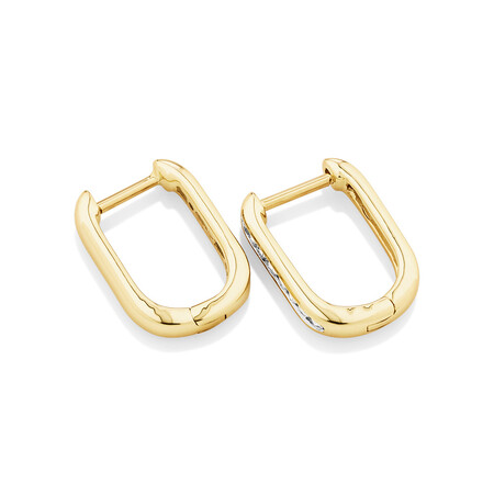 Huggies with 0.14 Carat TW of Diamonds in 10kt Yellow Gold Huggies with 0.14 Carat TW of Diamonds in 10kt Yellow Gold