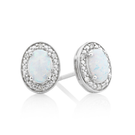 Halo Earrings with Created Opal and 0.04 Carat TW of Diamonds in Sterling Silver Halo Earrings with Created Opal and 0.04 Carat TW of Diamonds in Sterling Silver