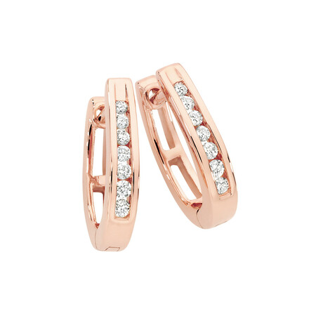 Huggie Earrings 0.15 Carat TW of Diamonds in 10ct Rose Gold Huggie Earrings 0.15 Carat TW of Diamonds in 10ct Rose Gold