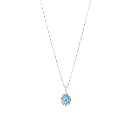 Halo Pendant with Blue Topaz and 0.04 carat TW of Diamonds in Sterling Silver Halo Pendant with Blue Topaz and 0.04 carat TW of Diamonds in Sterling Silver