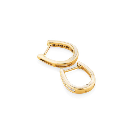 Huggie Earrings with 0.15 Carat TW of Diamonds in 10kt Rose Gold Huggie Earrings with 0.15 Carat TW of Diamonds in 10kt Rose Gold