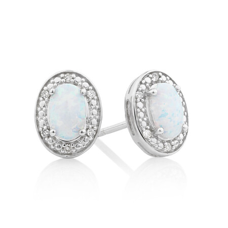 Halo Earrings with Created Opal and 0.04 Carat TW of Diamonds in Sterling Silver Halo Earrings with Created Opal and 0.04 Carat TW of Diamonds in Sterling Silver