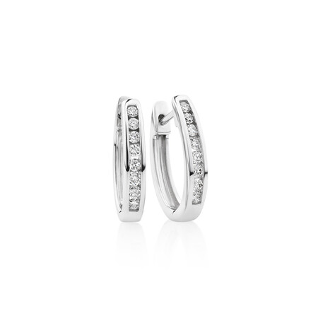 Oval Huggie Earrings with 0.25 Carat TW of Diamonds in 10kt White Gold Oval Huggie Earrings with 0.25 Carat TW of Diamonds in 10kt White Gold