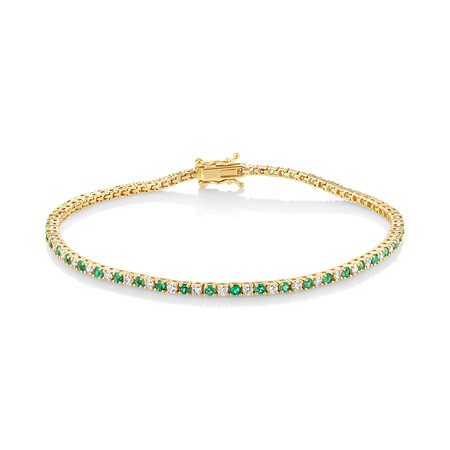 Tennis Bracelet with Emerald and 1 Carat TW of Diamonds in 10kt Yellow Gold