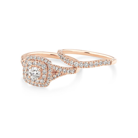 Bridal Set with 1.18 Carat TW of Diamonds in 14kt Rose Gold Bridal Set with 1.18 Carat TW of Diamonds in 14kt Rose Gold