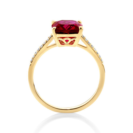 Ring with Cushion Cut Created Ruby & Diamonds in 10kt Yellow Gold Ring with Cushion Cut Created Ruby & Diamonds in 10kt Yellow Gold
