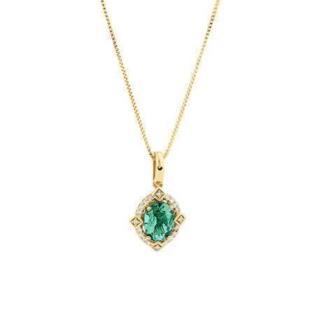 Halo Pendant with Laboratory Created Emerald & Natural Diamonds in 10kt Yellow Gold Halo Pendant with Laboratory Created Emerald & Natural Diamonds in 10kt Yellow Gold