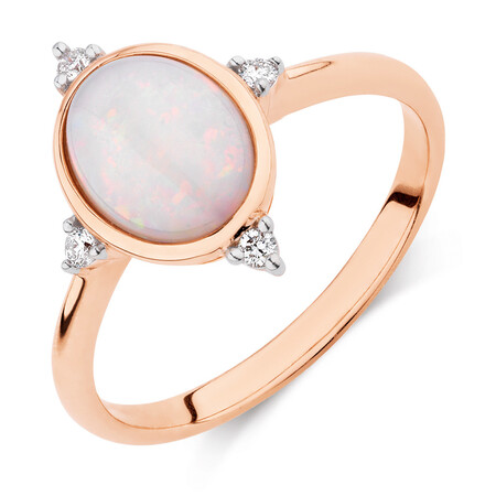 Ring with Opal & Diamonds in 10kt Rose Gold Ring with Opal & Diamonds in 10kt Rose Gold