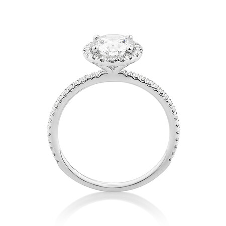 Halo Engagement Ring with 1.23 Carat TW of Diamonds. A 1 Carat Round Brilliant Laboratory-Created Centre Diamond and 0.23 Carat TW of Natural Diamonds in the Shoulders and Halo in 14kt White Gold Halo Engagement Ring with 1.23 Carat TW of Diamonds. A 1 Carat Round Brilliant Laboratory-Created Centre Diamond and 0.23 Carat TW of Natural Diamonds in the Shoulders and Halo in 14kt White Gold