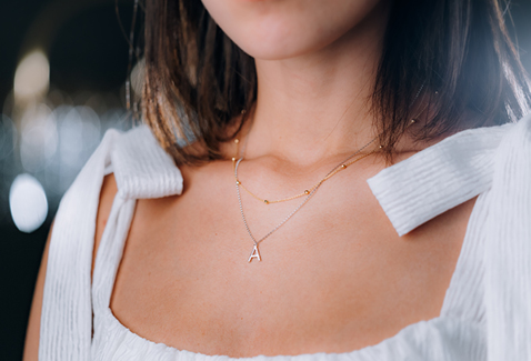 @alishayi wearing dainty necklaces and an initial pendant @alishayi wearing dainty necklaces and an initial pendant