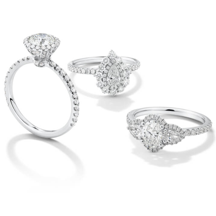 Our Sir Michael Hill Designer Bridal Collection features a range of beautiful silhouette capsules, including: new Designer Three Stone, new Designer Halo, Designer Double Halo, and Designer Solitaire with Pavé. Each ring is crafted to the highest workmanship standards, with diamonds individually hand-set by highly skilled craftsmen and finished with the signature hidden pink sapphire for a unique touch. 